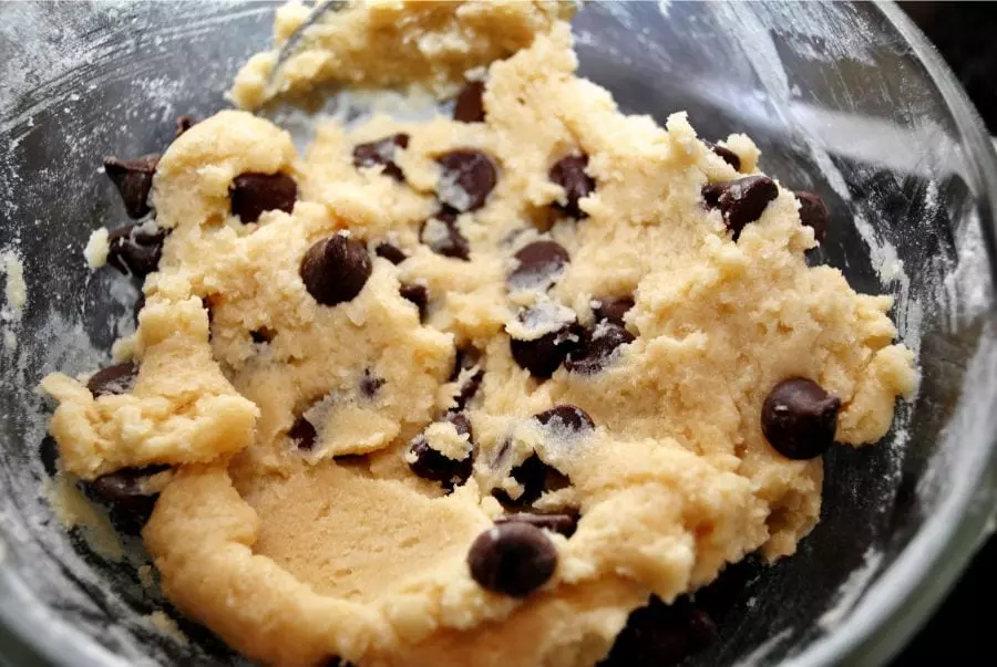 What causes the cookie dough to become crumbly?