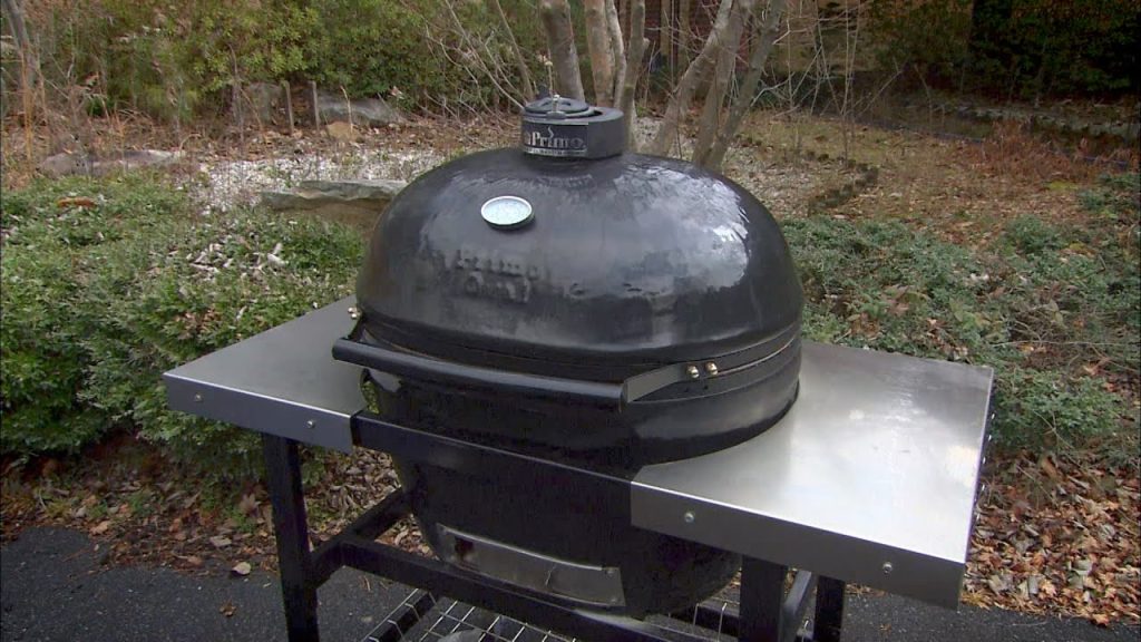 A ceramic barbecue similar to a Big Green Egg or a Kamado.