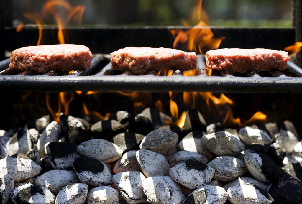 Is it possible to use charcoal in a gas grill?