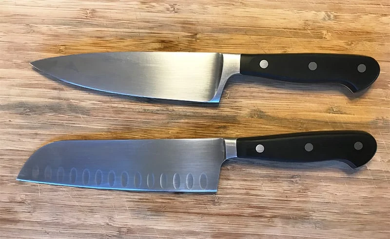 What distinguishes a Santoku knife from a chef's knife?
