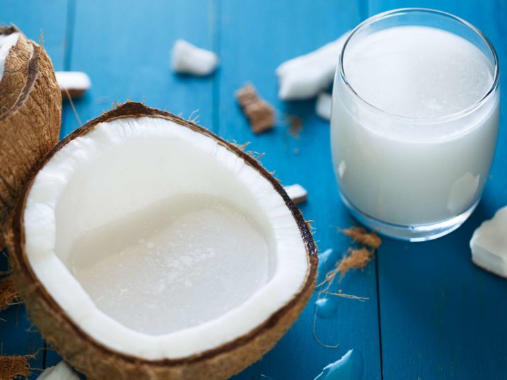 What is coconut milk, and how is it produced?