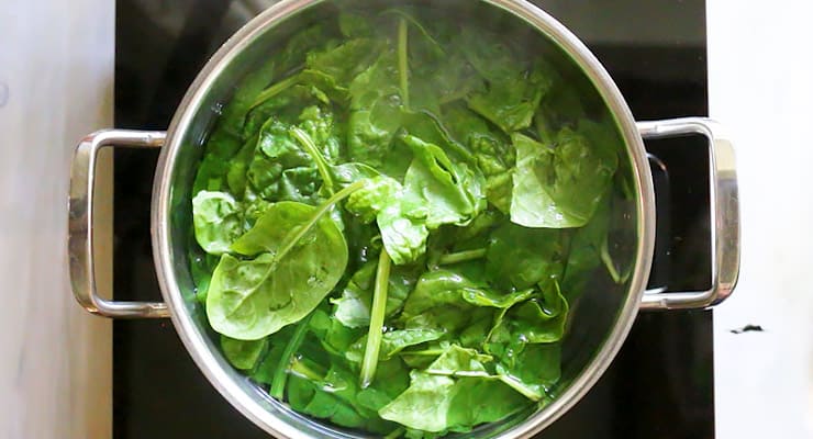 Use warm water to defrost spinach