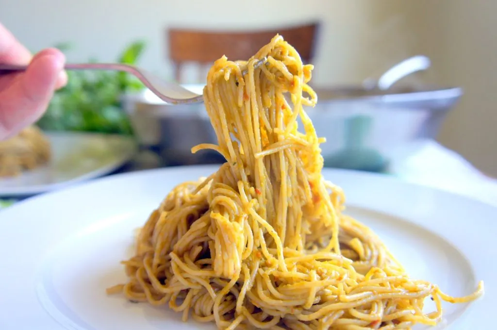 How can you keep your pasta from sticking together after it's been cooked?