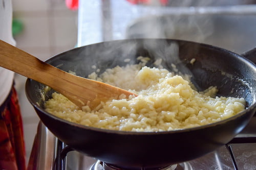 Do you cover the risotto as it cooks?