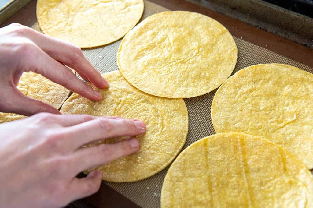 Is it possible to make enchiladas with uncooked tortillas?