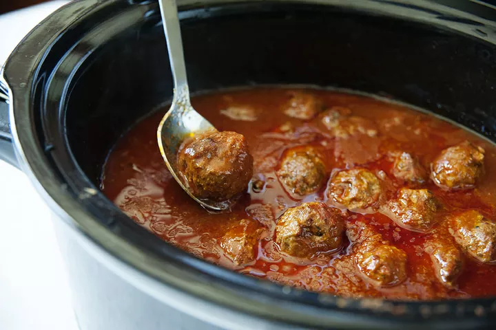 How long can meatballs stay in a Slow cooker