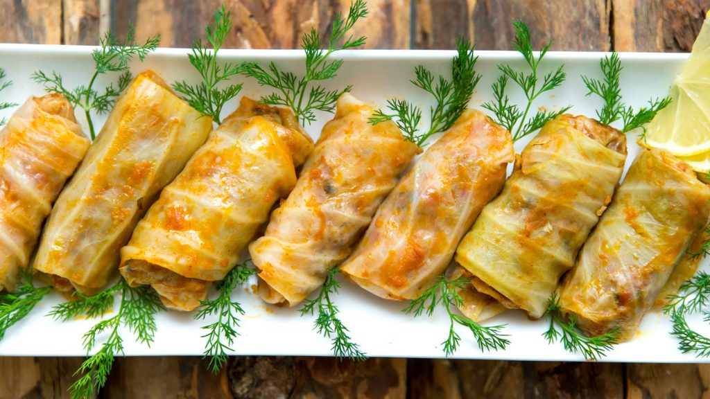 Serve cabbage rolls with vegetables
