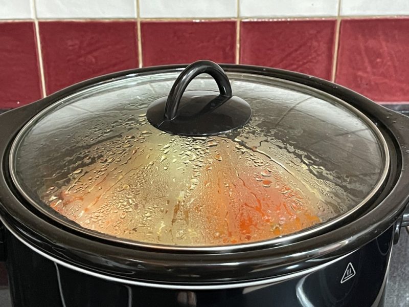 In a slow cooker, should the food be covered with liquid?