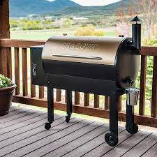 What is the best way to warm a Traeger grill?