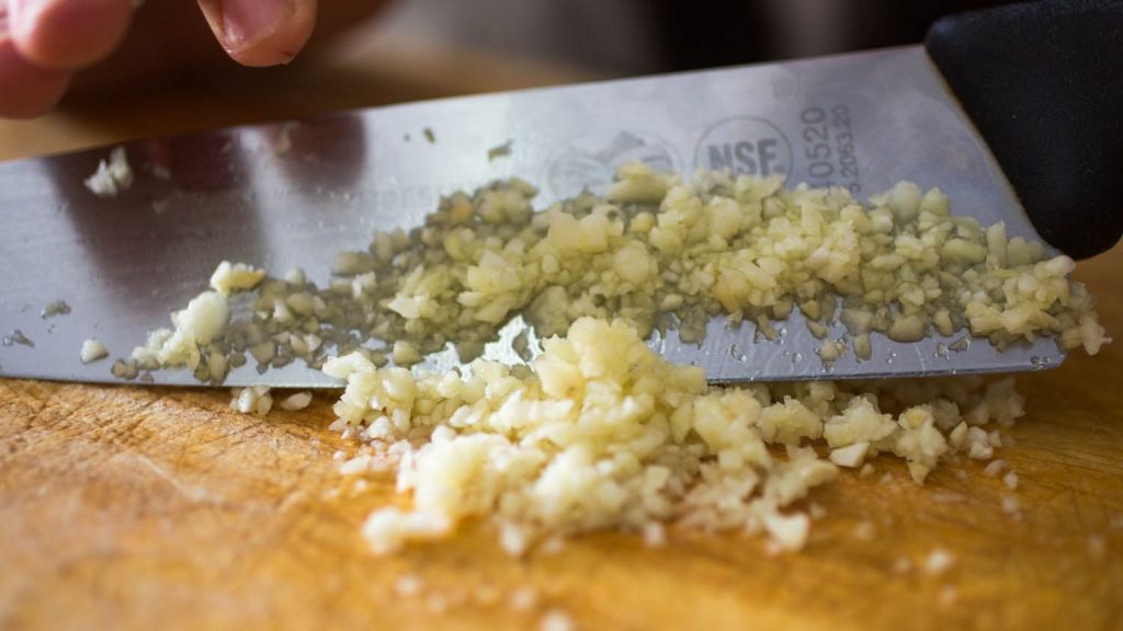 Ingredients for making minced garlic in a jar