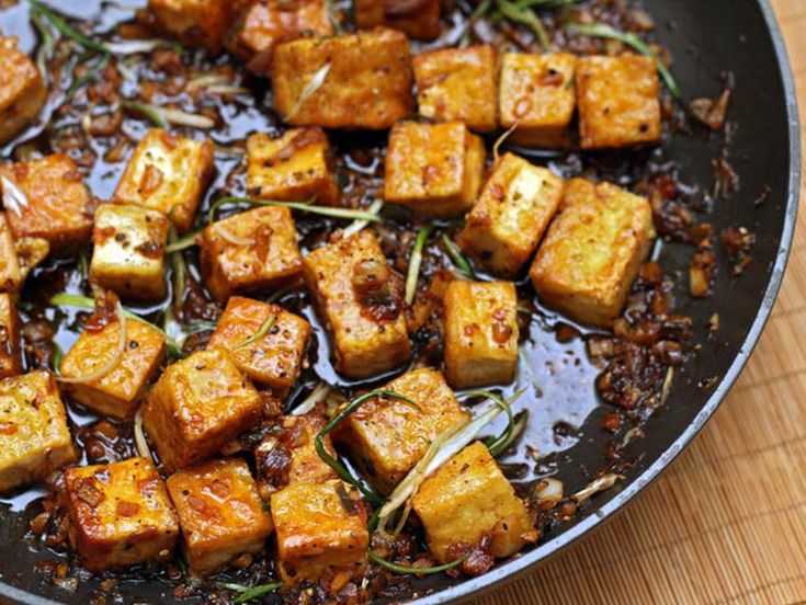 Tofu marinated in soy sauce with fried rice