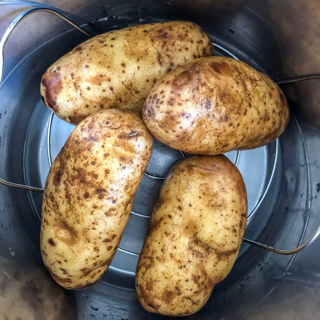 Is it necessary to soak my potatoes before frying them?