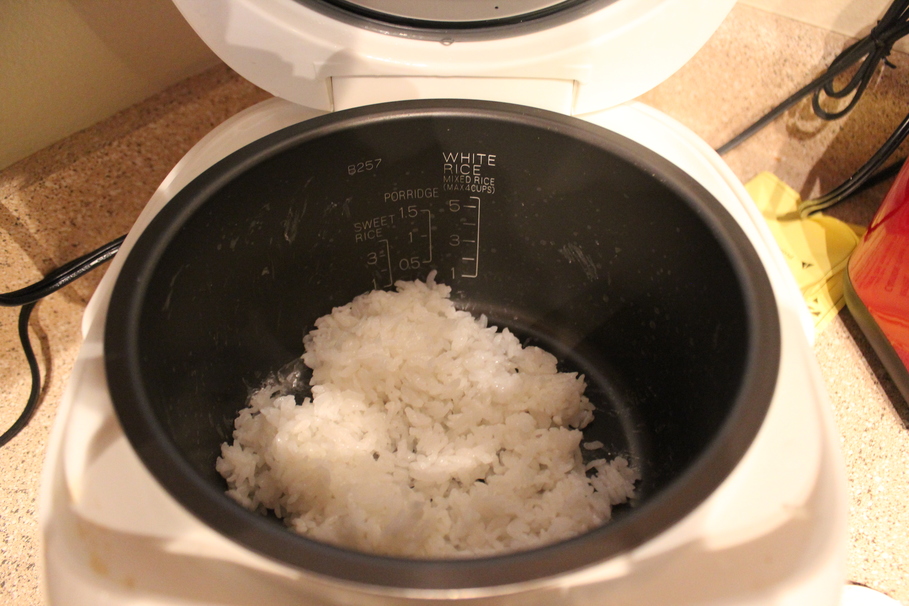 In a rice cooker, how long can rice be kept warm?