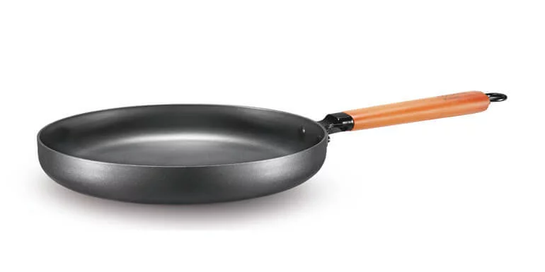 treated steel versus carbon steel wok