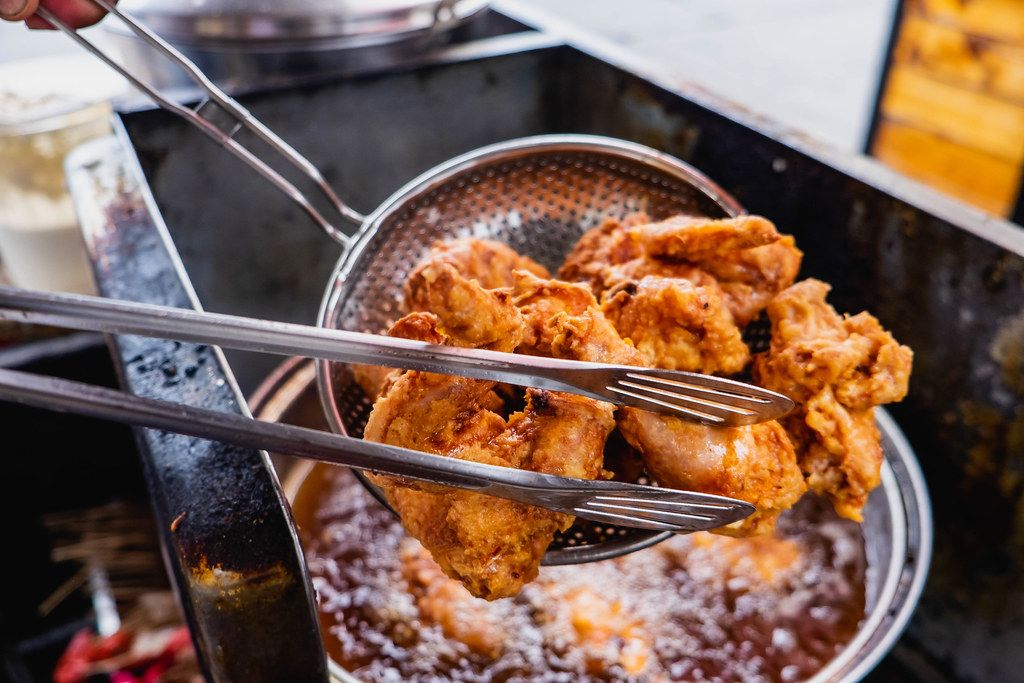Can the oil be reused after frying the chicken?
